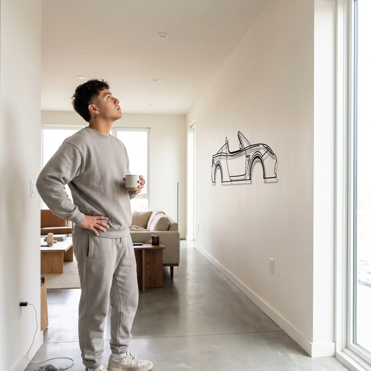 2008-2012 Tesla Roadster Gen 1 metal wall art shown to scale beside a person