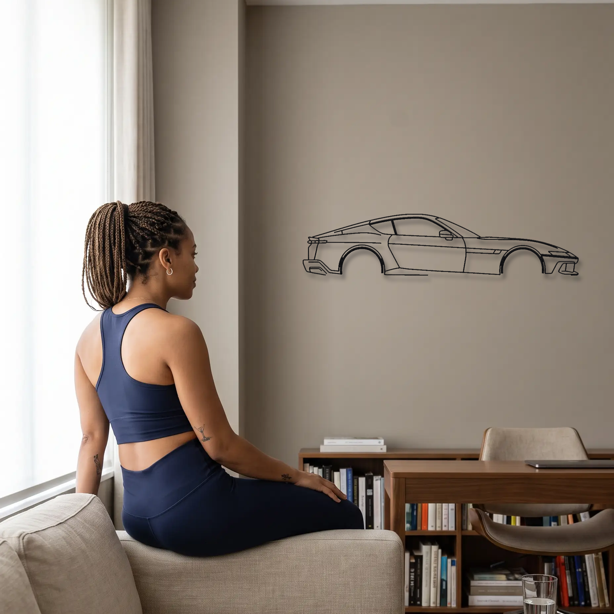 Ferrari 12Cilindri metal wall art shown to scale beside a person