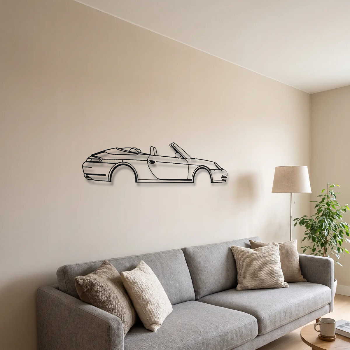 Porsche 911 Carrera Cabriolet 996 metal wall art above a sofa in a living room