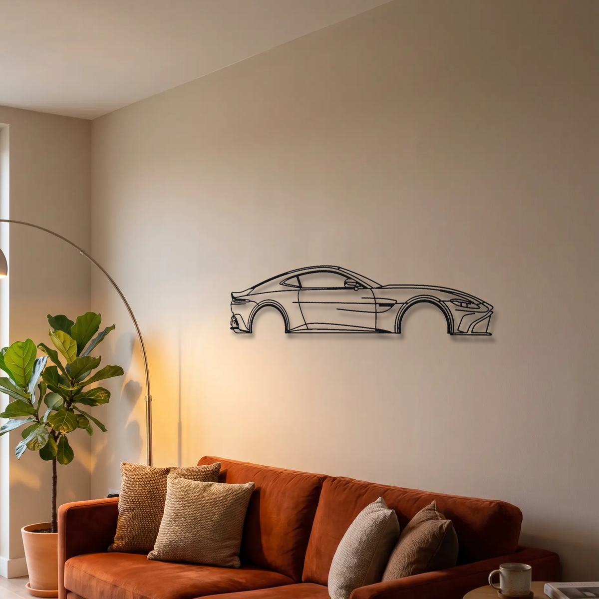 2022-2023 Aston Martin V12 Vantage metal wall art above a sofa in a living room