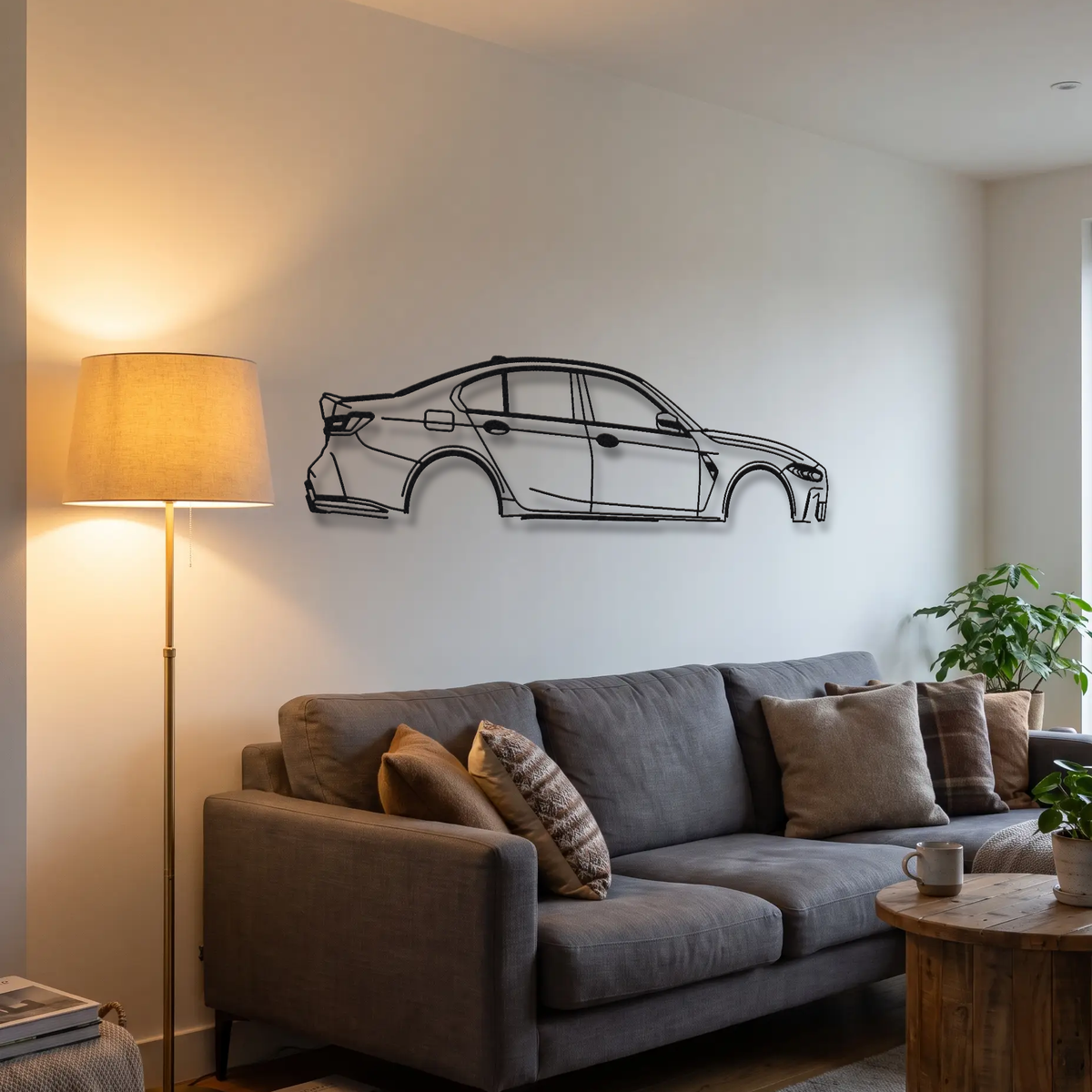 BMW M3 G80 metal wall art above a sofa in a living room