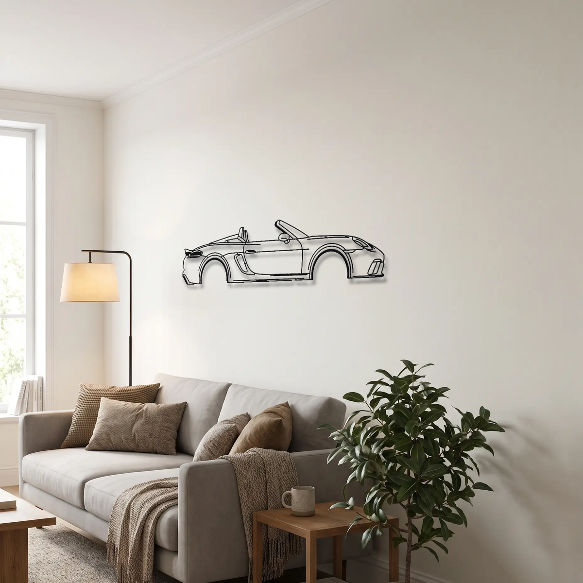 Porsche 718 Spyder 982 metal wall art above a sofa in a living room