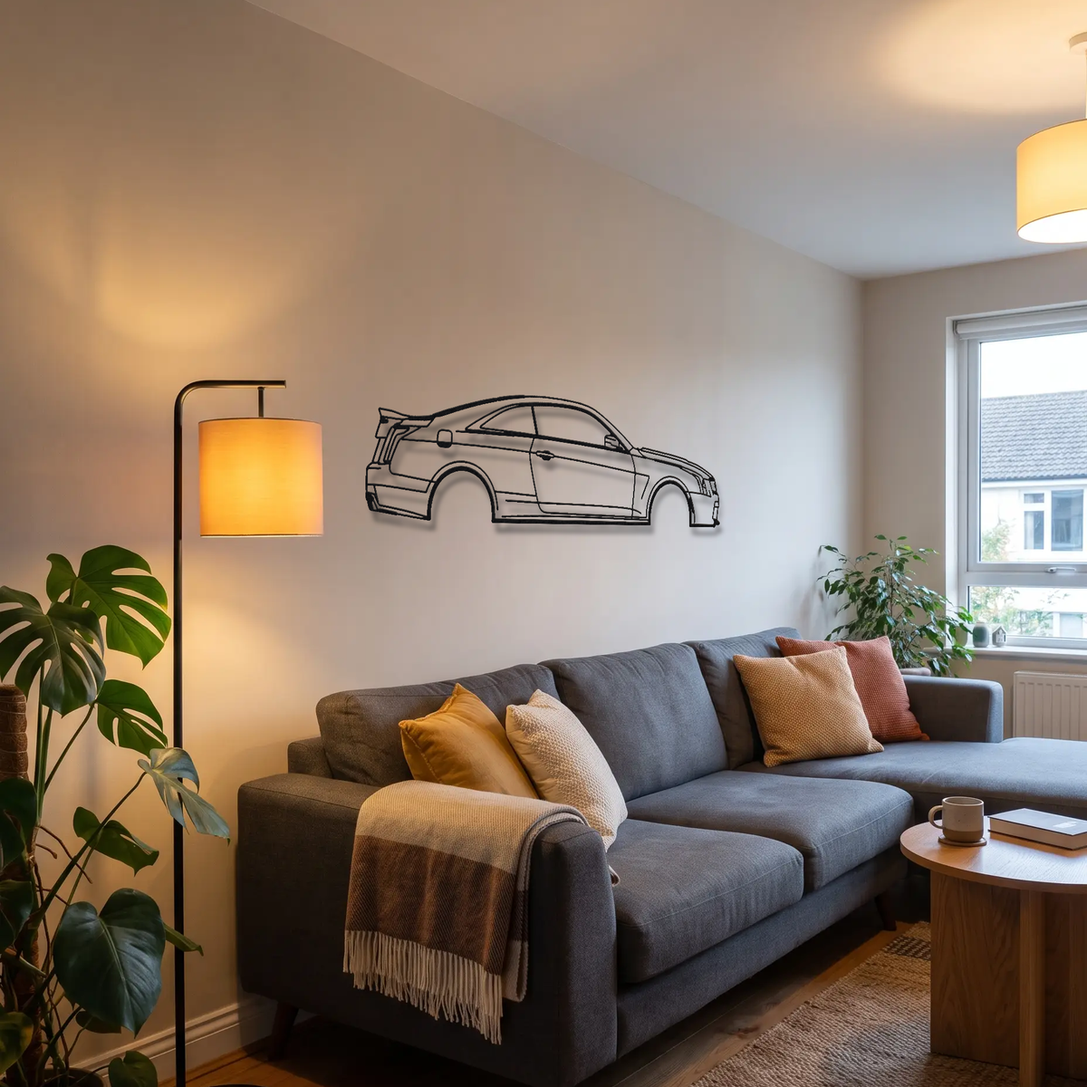 Cadillac ATS-V Coupe metal wall art above a sofa in a living room