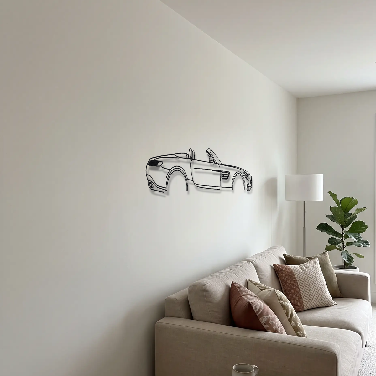 Mercedes-AMG GT Roadster R190 metal wall art above a sofa in a living room