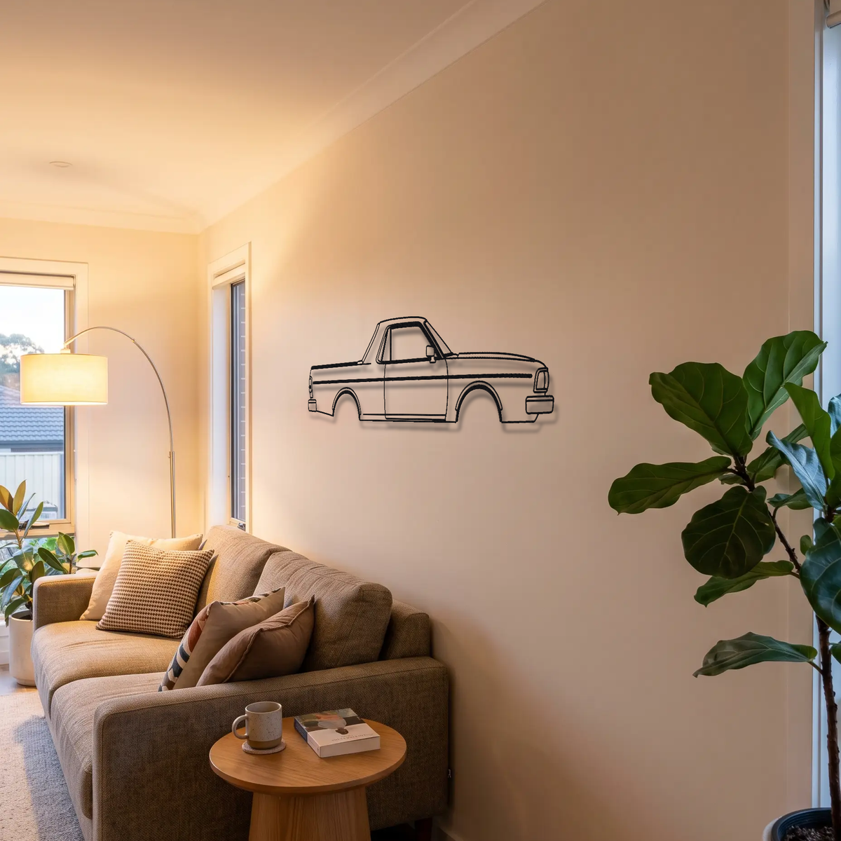 Subaru BRAT Gen 1 metal wall art above a sofa in a living room
