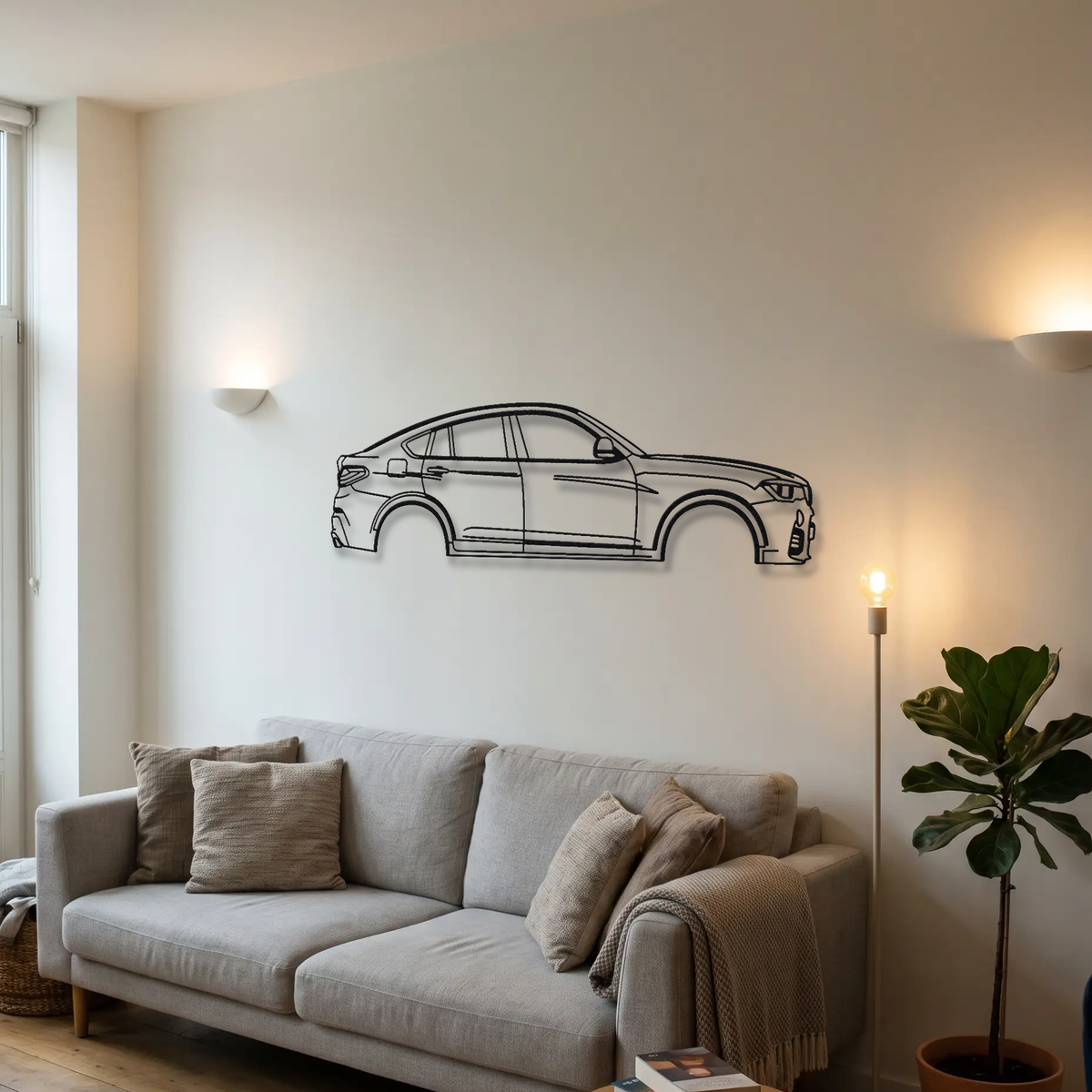 BMW X4M F26 metal wall art above a sofa in a living room
