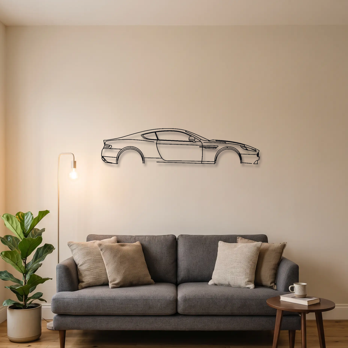 Aston Martin DB9 Coupe metal wall art above a sofa in a living room