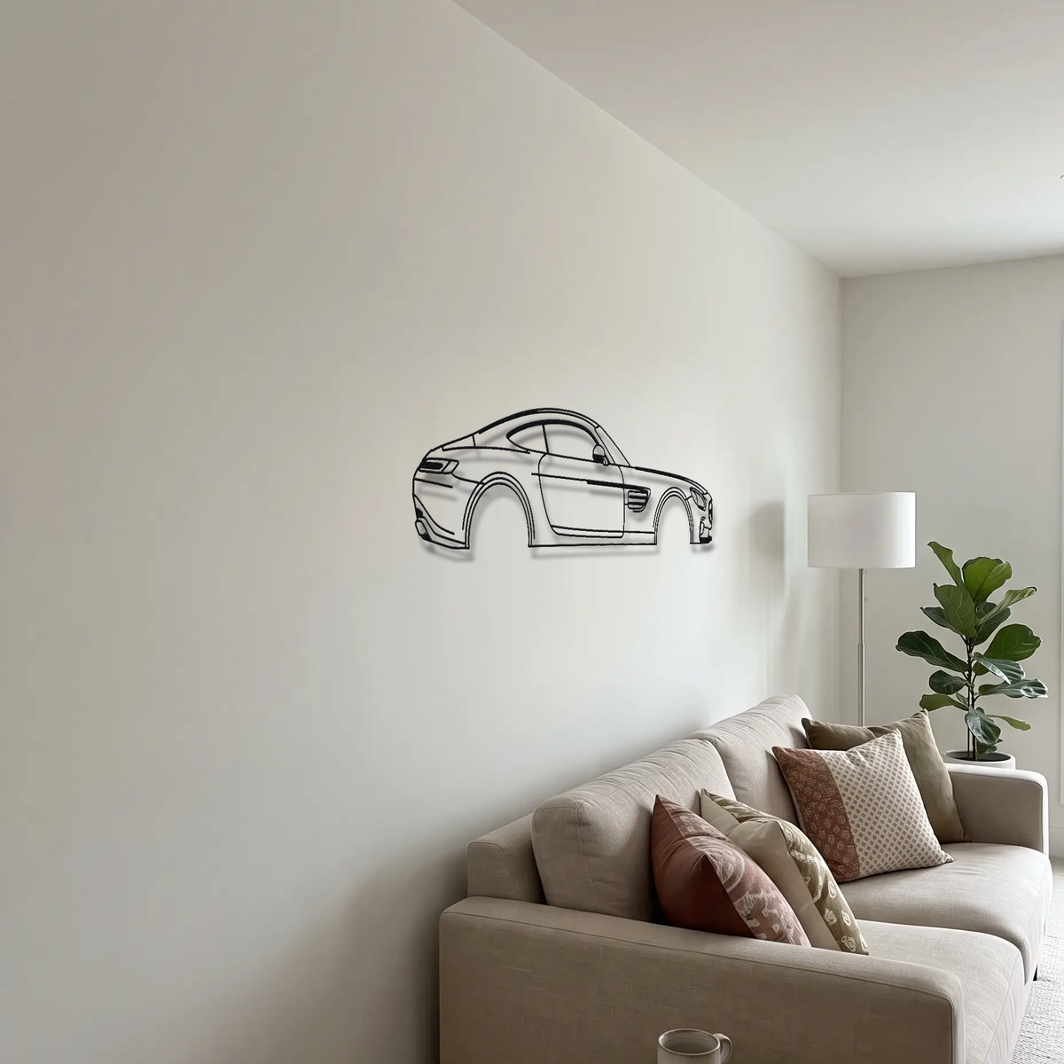 Mercedes-AMG GT C190 metal wall art above a sofa in a living room