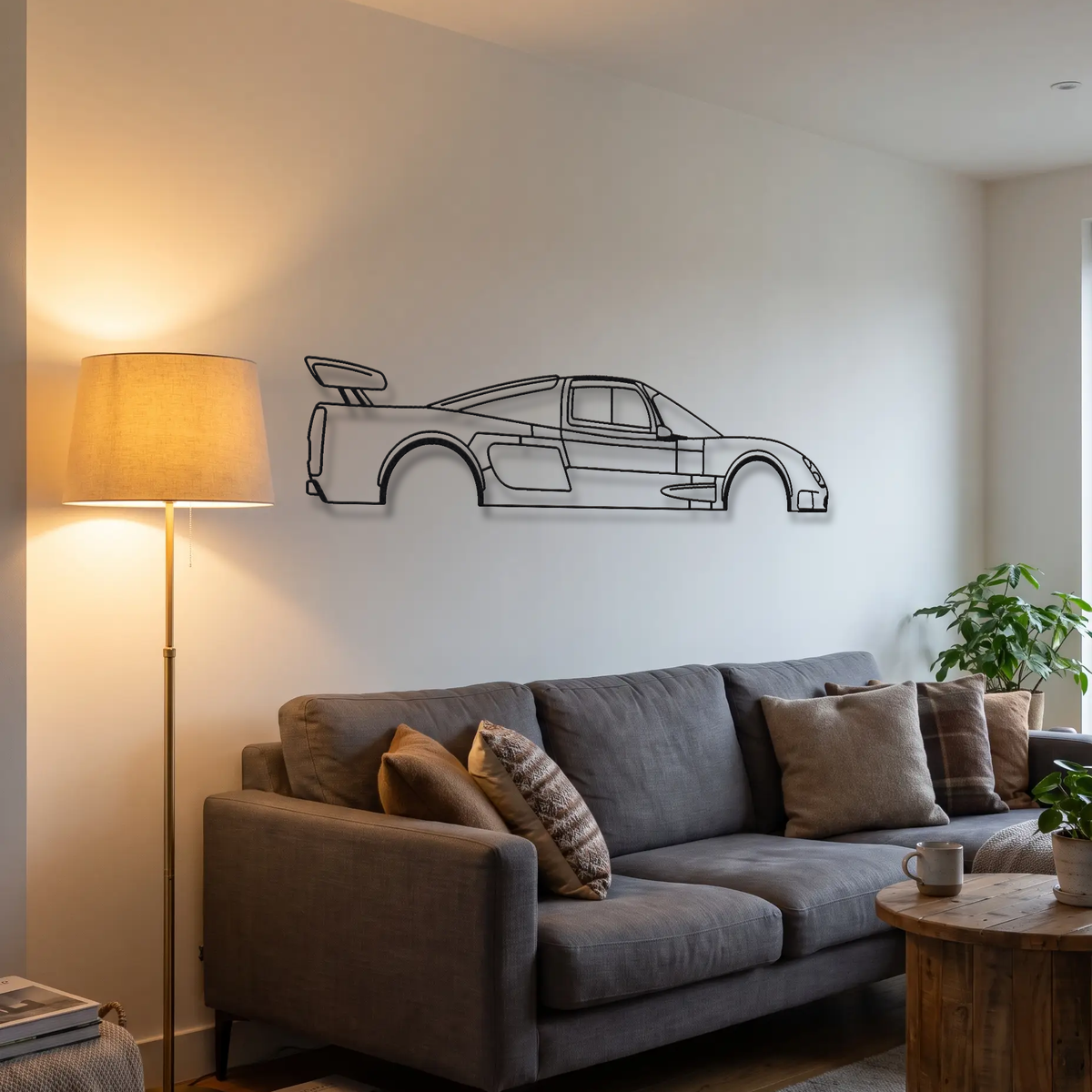 Ultima GTR metal wall art above a sofa in a living room