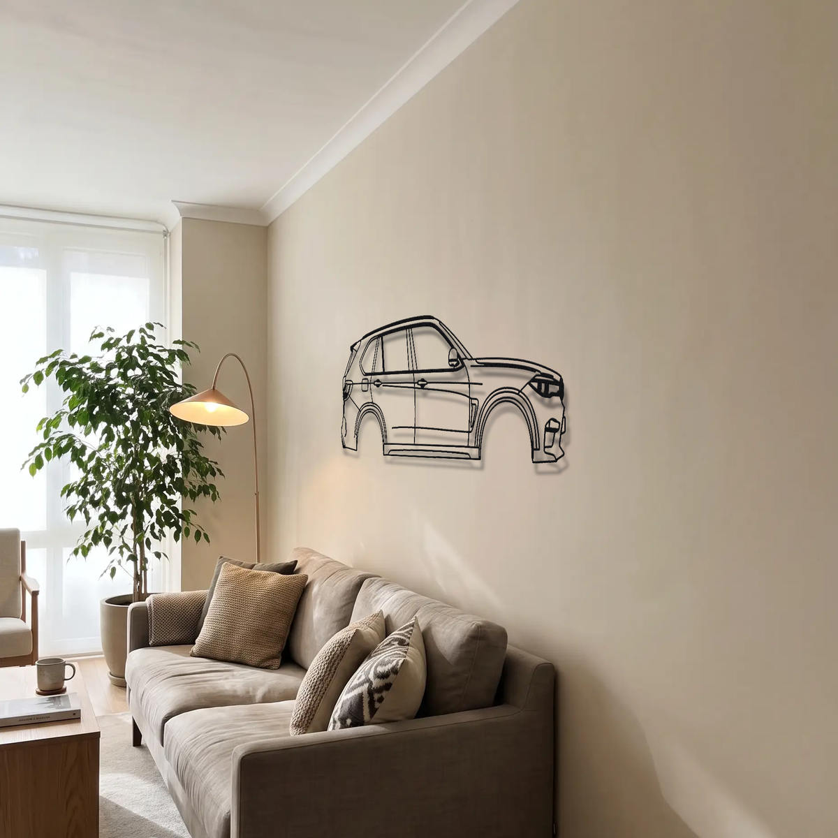 BMW X5M F85 metal wall art above a sofa in a living room