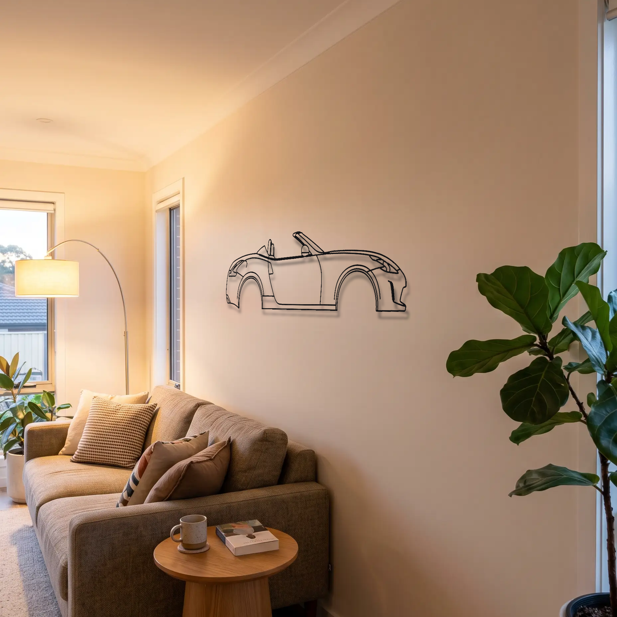 Nissan 370Z Roadster metal wall art above a sofa in a living room