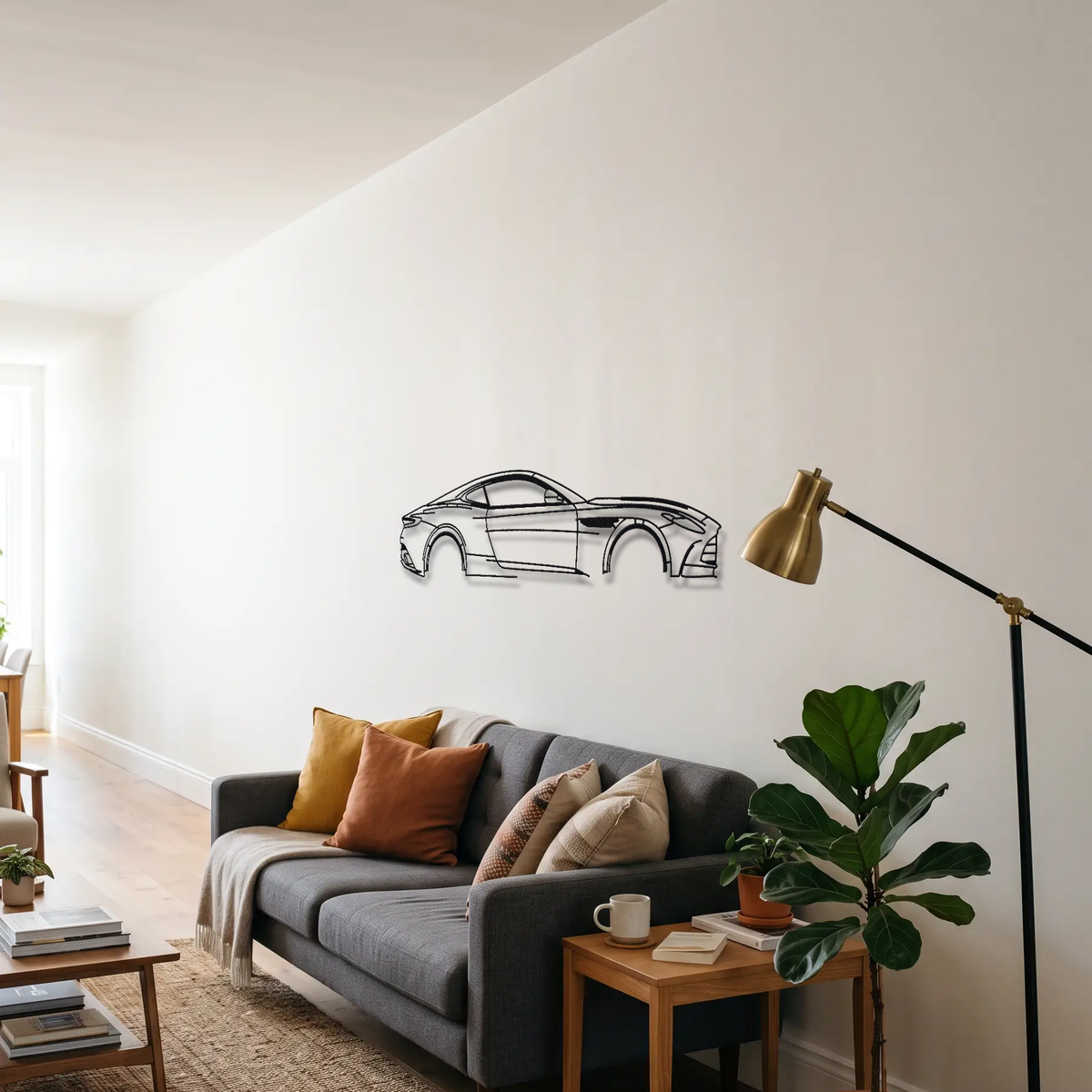 Aston Martin DB12 Coupe metal wall art above a sofa in a living room