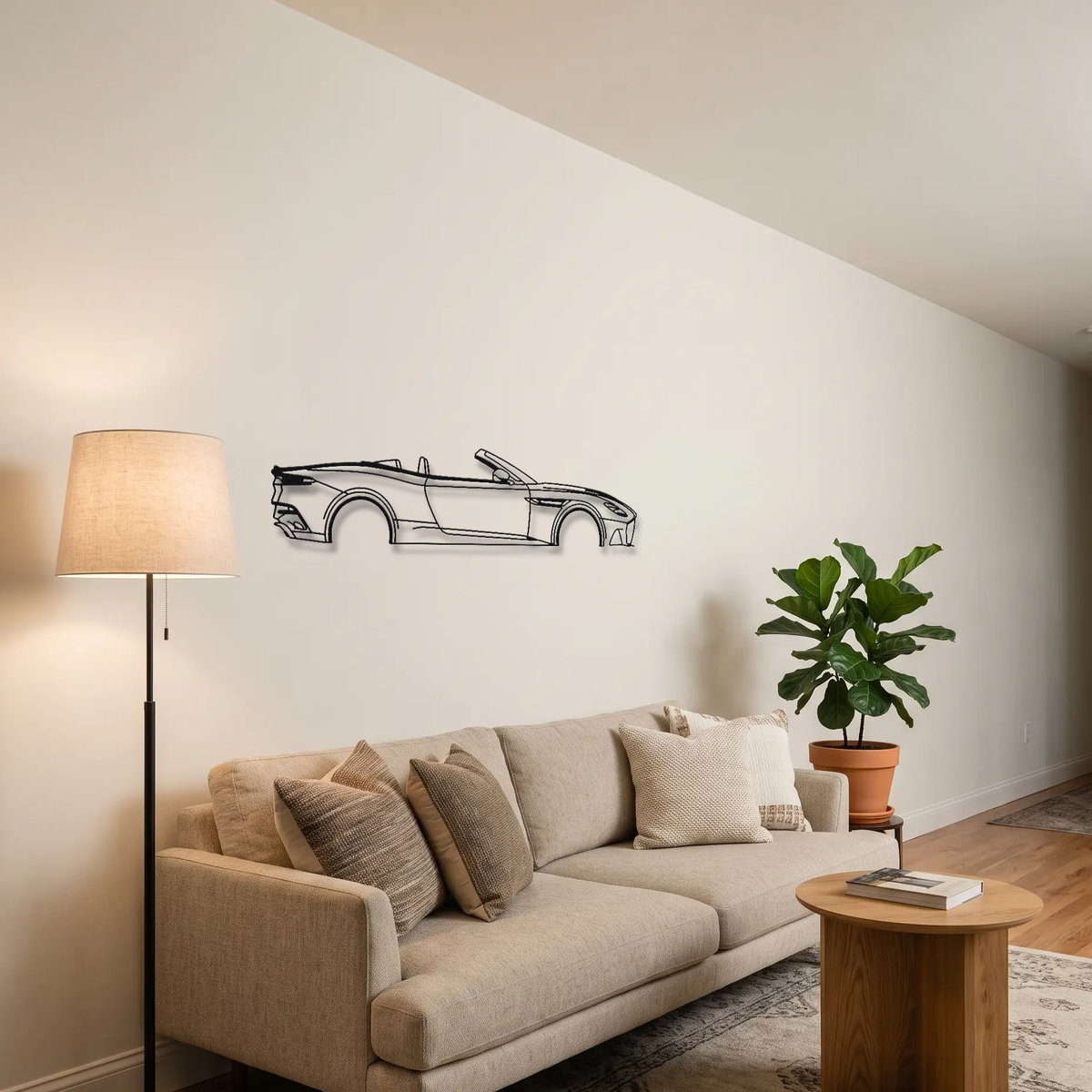 Aston Martin DBS Superleggera Volante metal wall art above a sofa in a living room