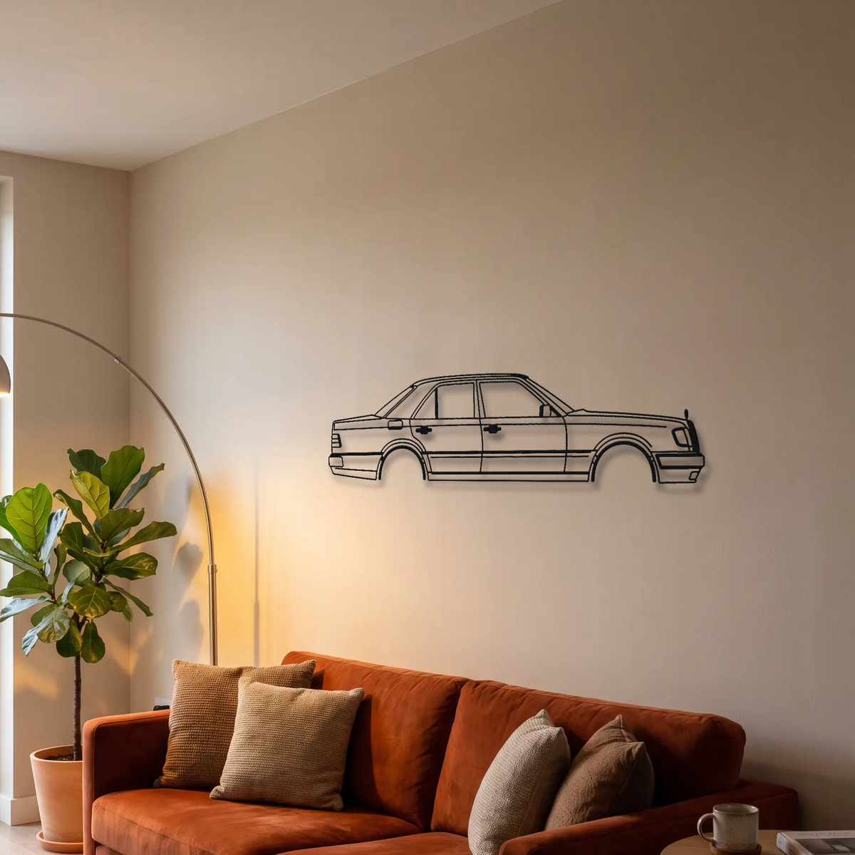 Mercedes-Benz E 60 AMG W124 metal wall art above a sofa in a living room