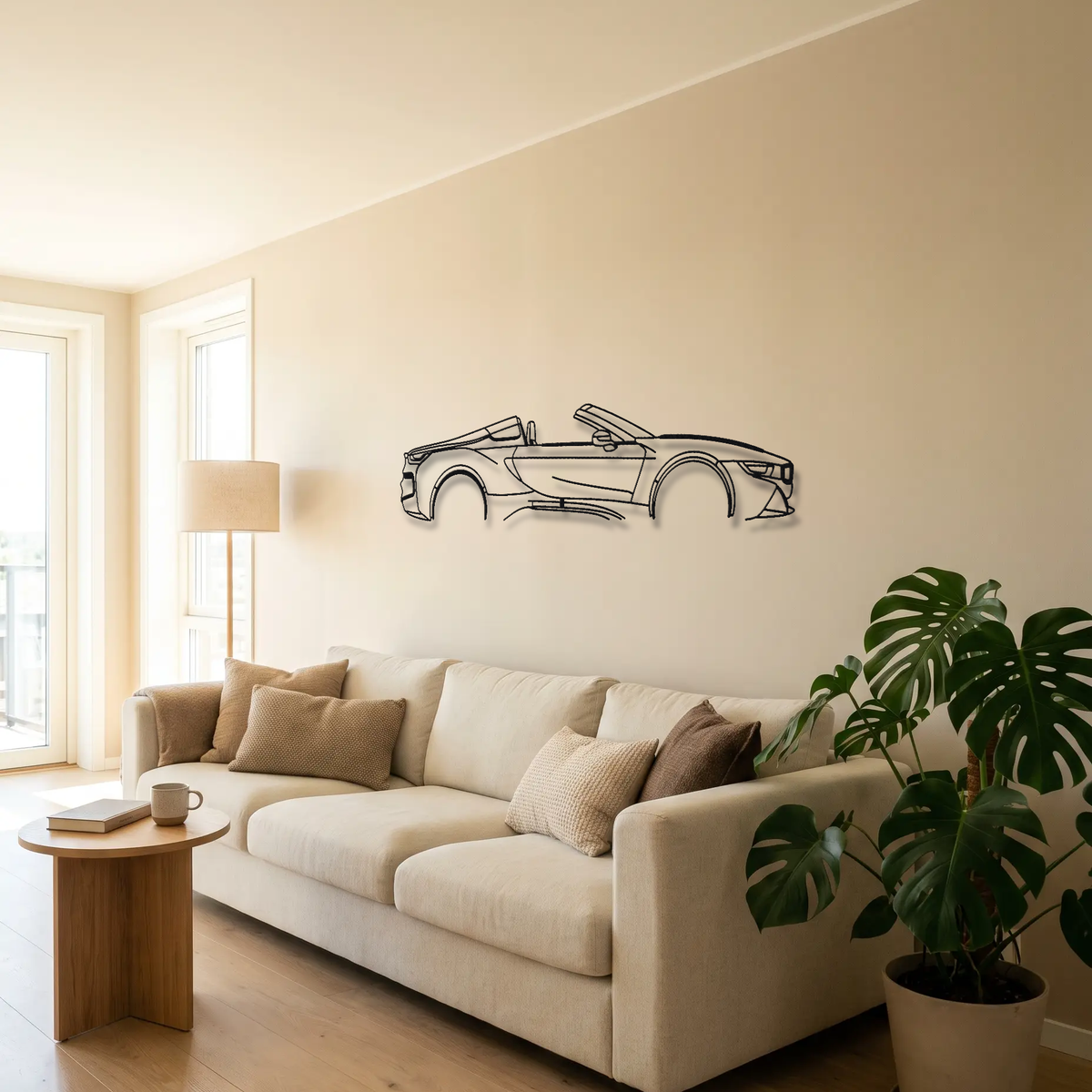 BMW i8 Roadster metal wall art above a sofa in a living room