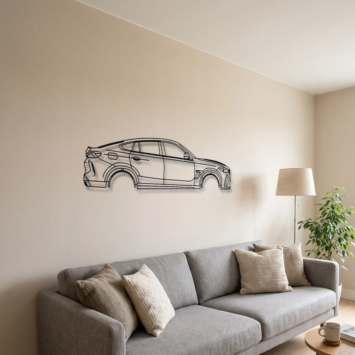 BMW X6M F96 metal wall art above a sofa in a living room