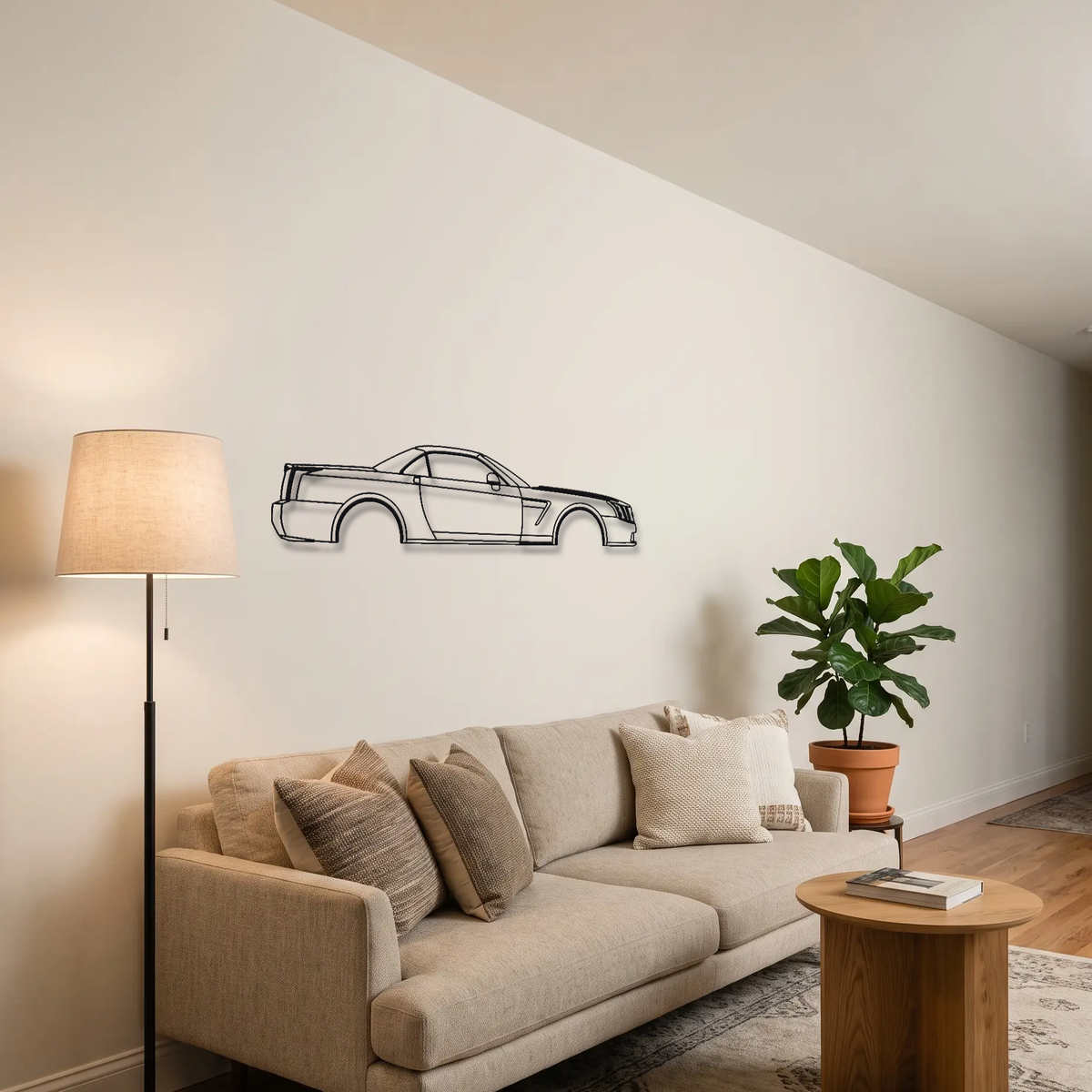 Cadillac XLR-V metal wall art above a sofa in a living room