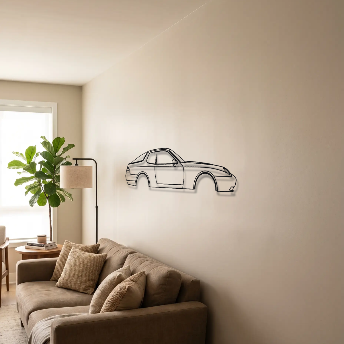 Porsche 968 metal wall art above a sofa in a living room