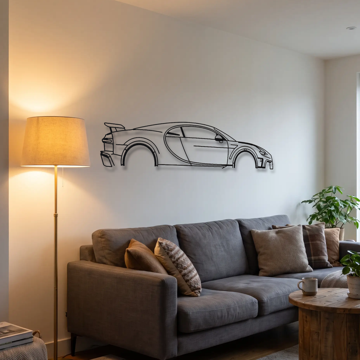 Bugatti Chiron Pur Sport metal wall art above a sofa in a living room