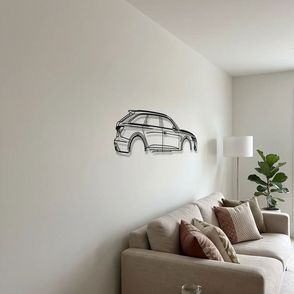 Audi RS6 Avant C8 metal wall art above a sofa in a living room